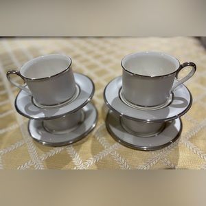 Lenox, ivory frost tea cup set of 4. Never used put in China cabinet.